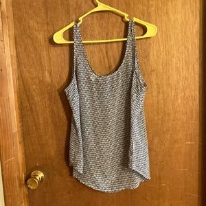 Very lt wt. shirt. Curved bottom of shirt. Long enough to cover hips.